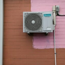 A air conditioner mounted to the side of a building