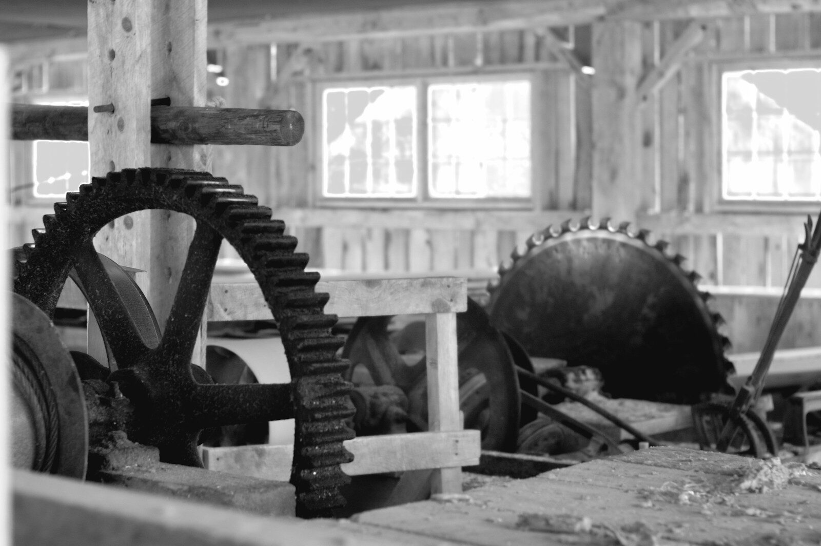A black and white photo of a machine in a building