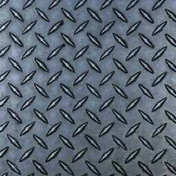 a close up of a metal diamond plate