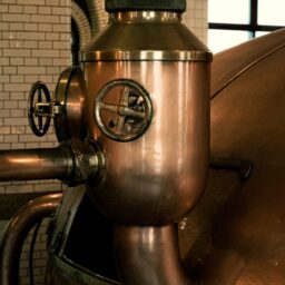 a large metal tank sitting inside of a building